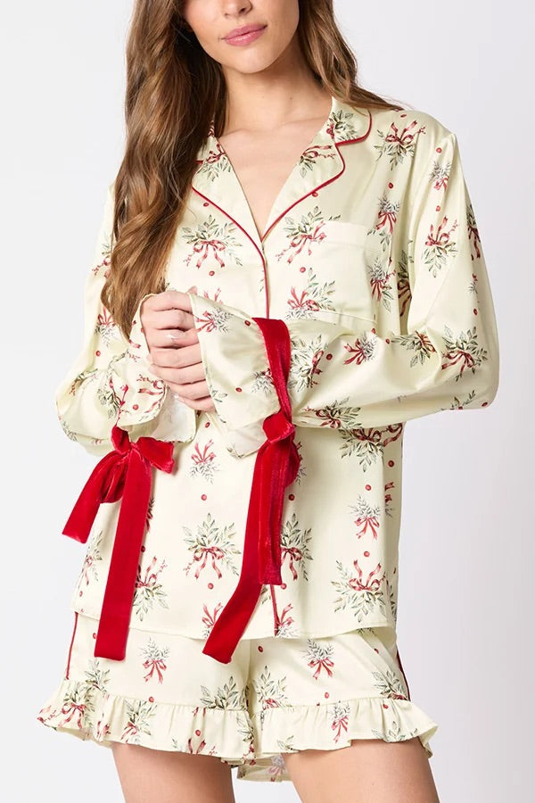 Velina Moda | Christmas Fashion Printed Bow Top and Elastic Waist Ruffle Shorts Set