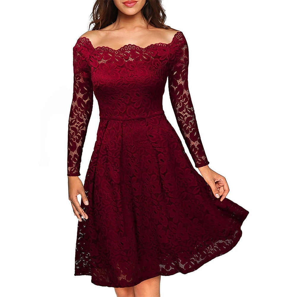 Lace dress with neckline opening and sleeves