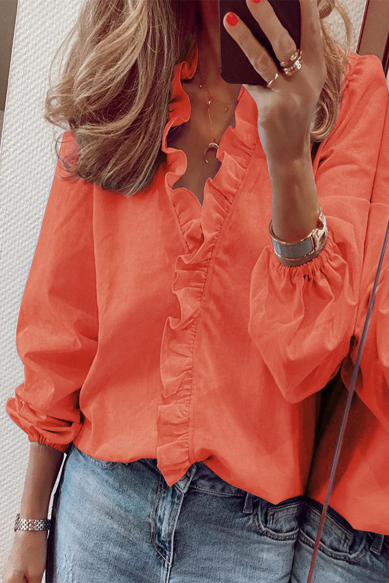 Long sleeve blouse with V-neck and ruffles