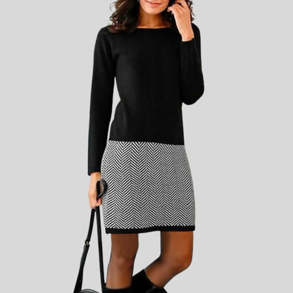 Elegant dress with houndstooth hem