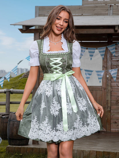 Green dirndl with floral lace and satin bow
