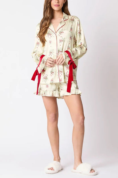 Velina Moda | Christmas Fashion Printed Bow Top and Elastic Waist Ruffle Shorts Set