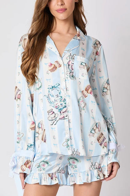 Velina Moda | Christmas Fashion Printed Bow Top and Elastic Waist Ruffle Shorts Set