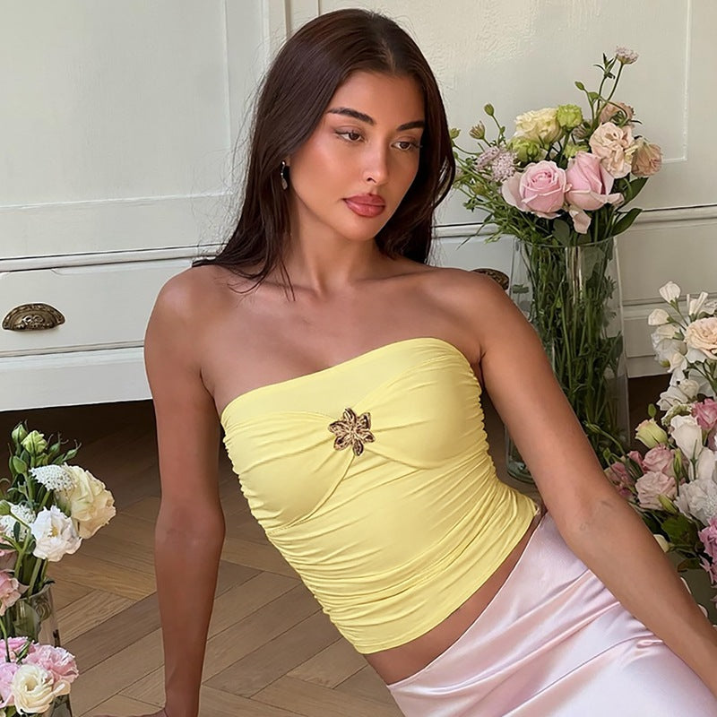 Ruffled strapless top with brooch detail