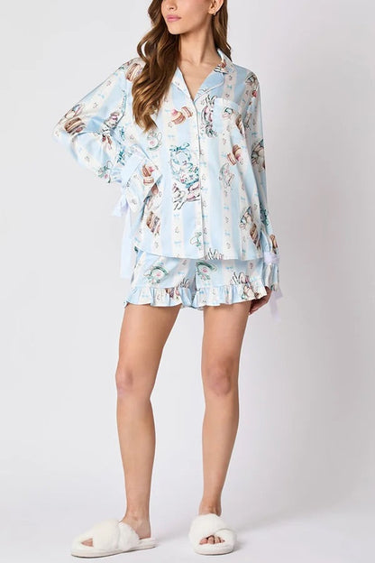 Velina Moda | Christmas Fashion Printed Bow Top and Elastic Waist Ruffle Shorts Set