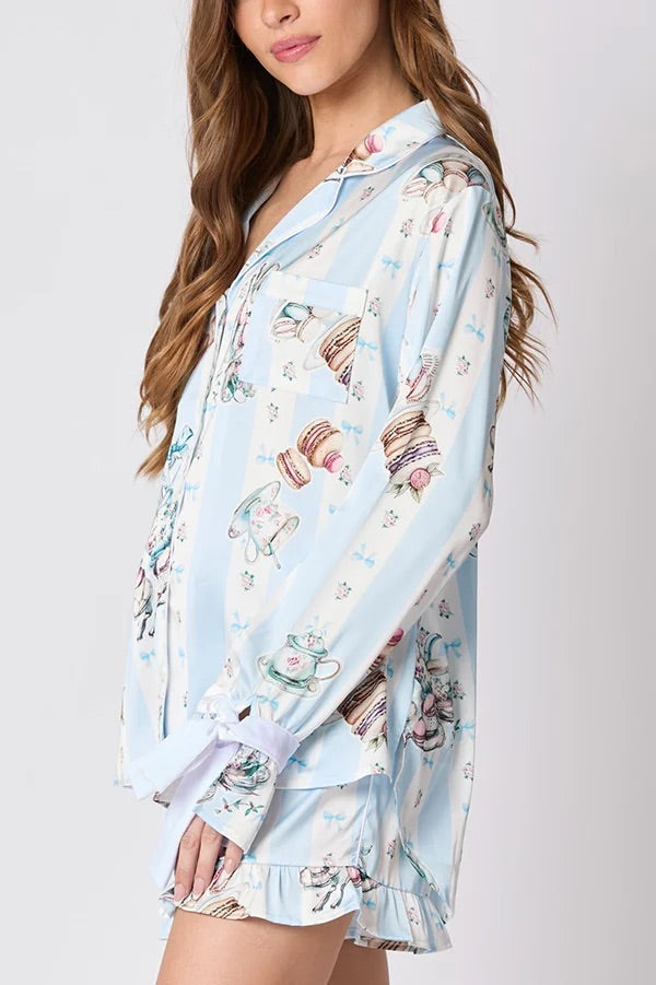 Velina Moda | Christmas Fashion Printed Bow Top and Elastic Waist Ruffle Shorts Set