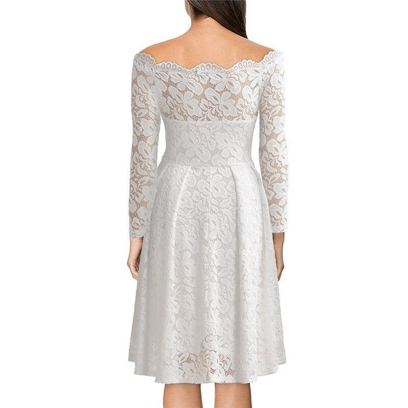 Lace dress with neckline opening and sleeves