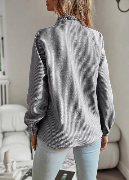 Fashion blouse with long sleeves and stripe pattern