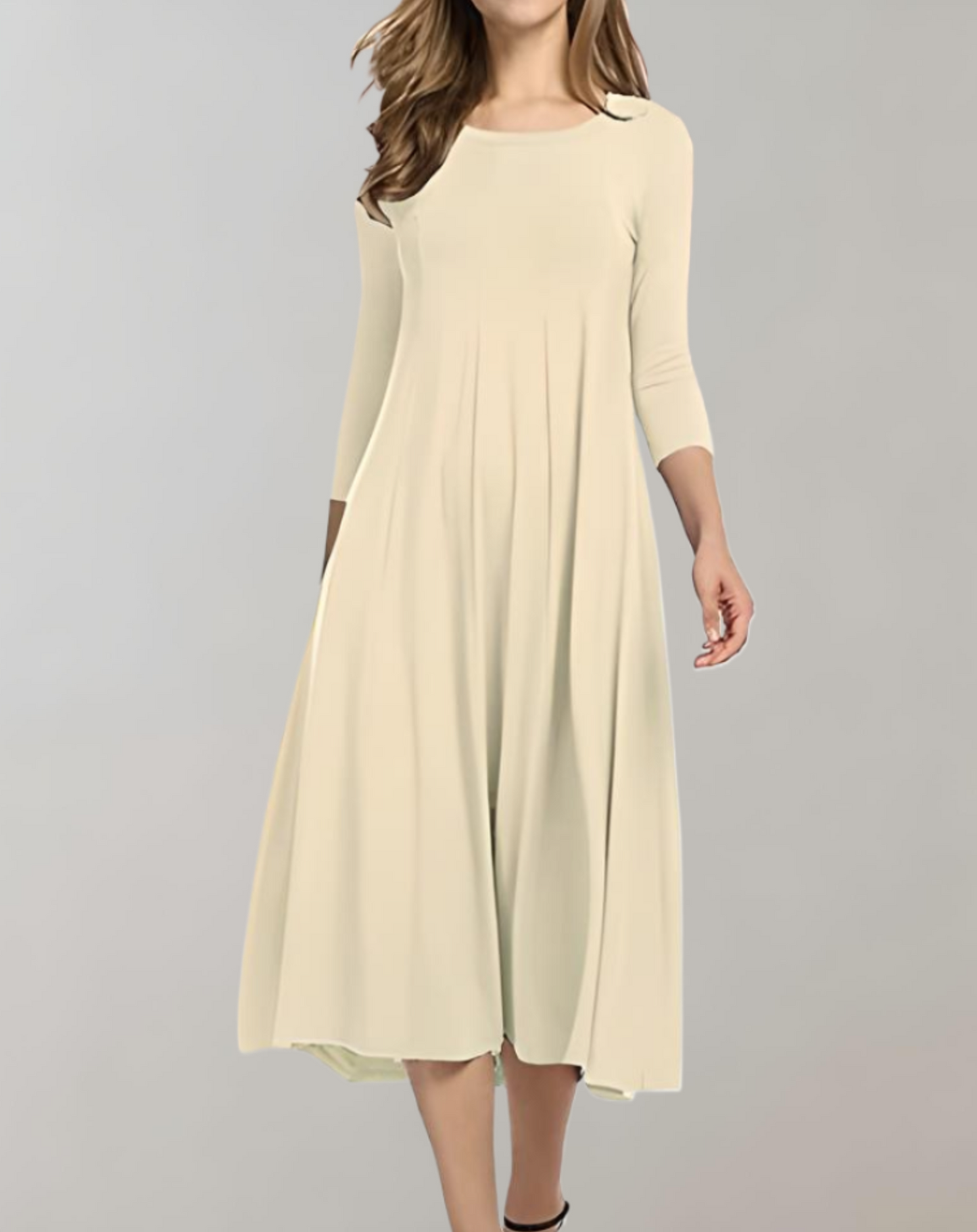 Swing dress with 3/4 sleeves and round neckline