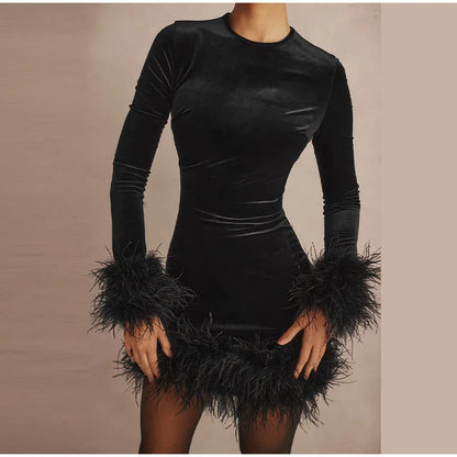 Elegant sheath dress with feather embellishments on the sleeves