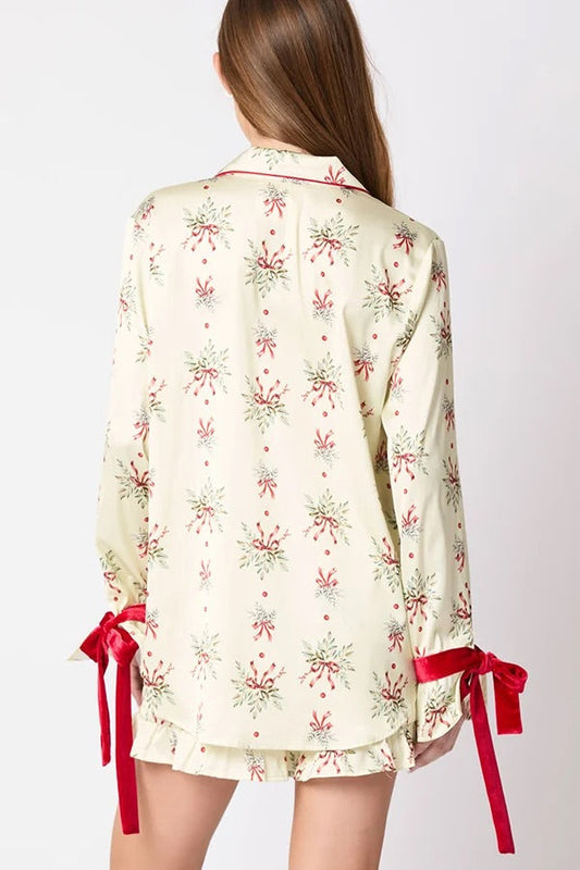Velina Moda | Christmas Fashion Printed Bow Top and Elastic Waist Ruffle Shorts Set