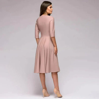 Velina Moda | Elegant midi dress with a feminine silhouette