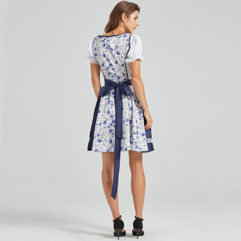 Navy blue dirndl with floral embroidery and bow at the front