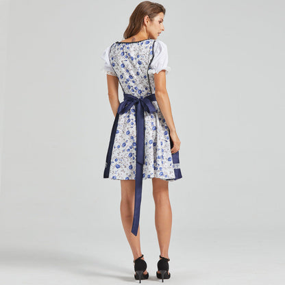 Navy blue dirndl with floral embroidery and bow at the front