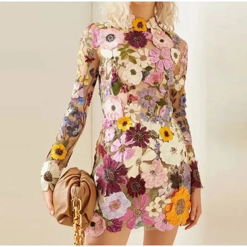 Mini dress with floral applications and translucent appearance